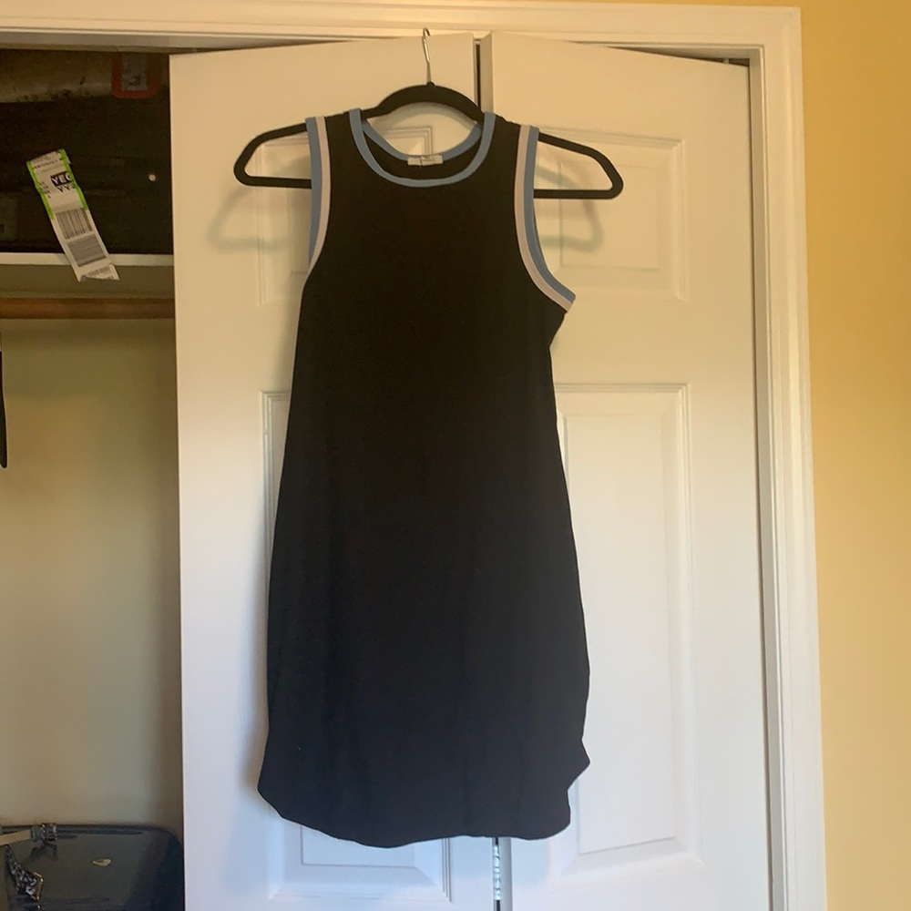 Black no sleeve dress with blue and white lining